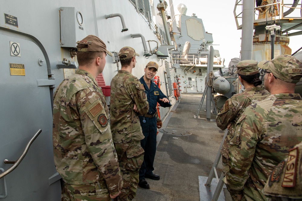 Airmen Tour Navy Ship