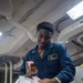 U.S. Navy Sailor Tapes Secures A Package