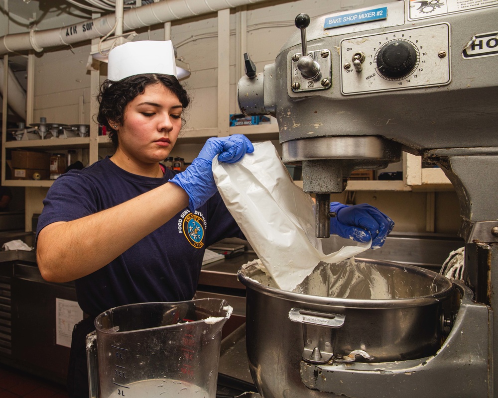 Sailor Adds ingredients To Mixer