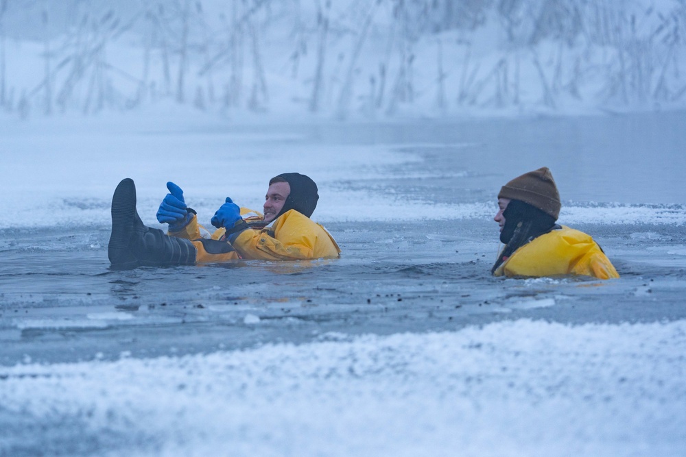 JBER Firefighters conduct Ice Water Rescue Training