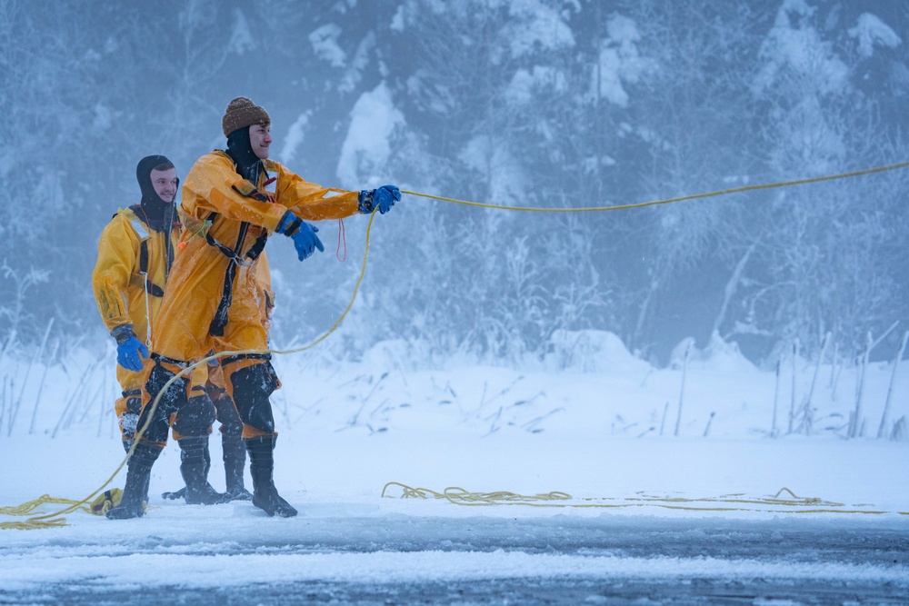 JBER Firefighters conduct Ice Water Rescue Training