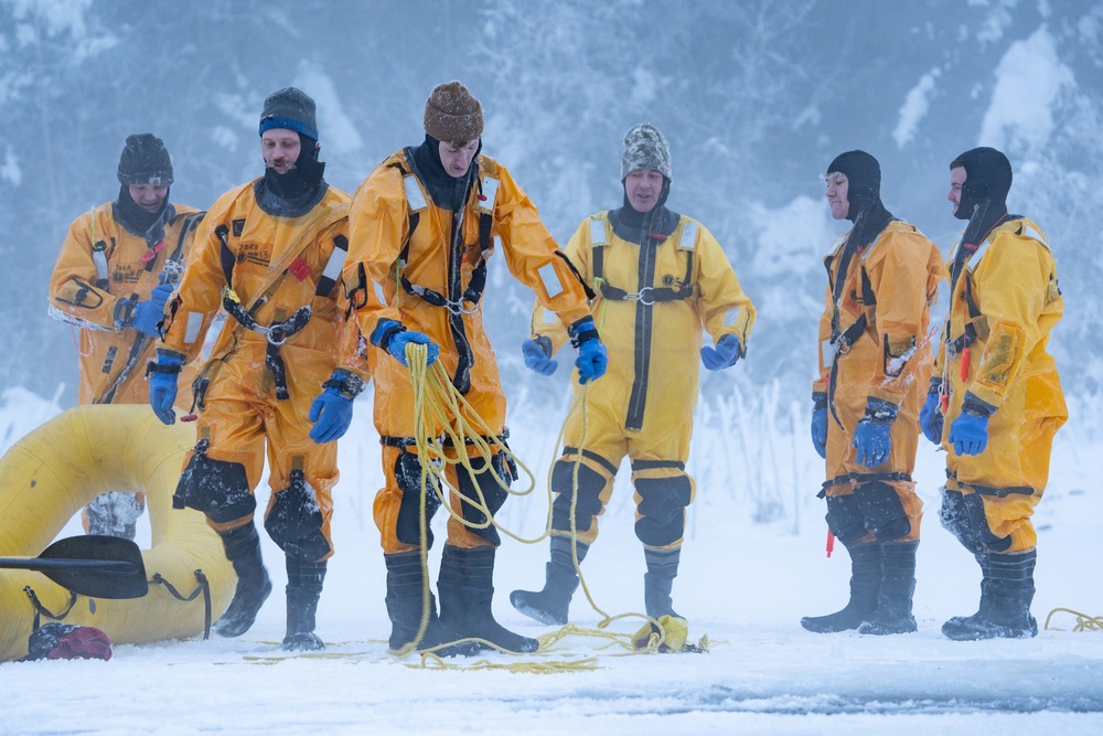 JBER Firefighters conduct Ice Water Rescue Training