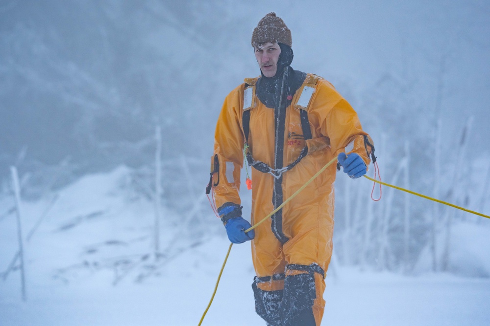 JBER Firefighters conduct Ice Water Rescue Training