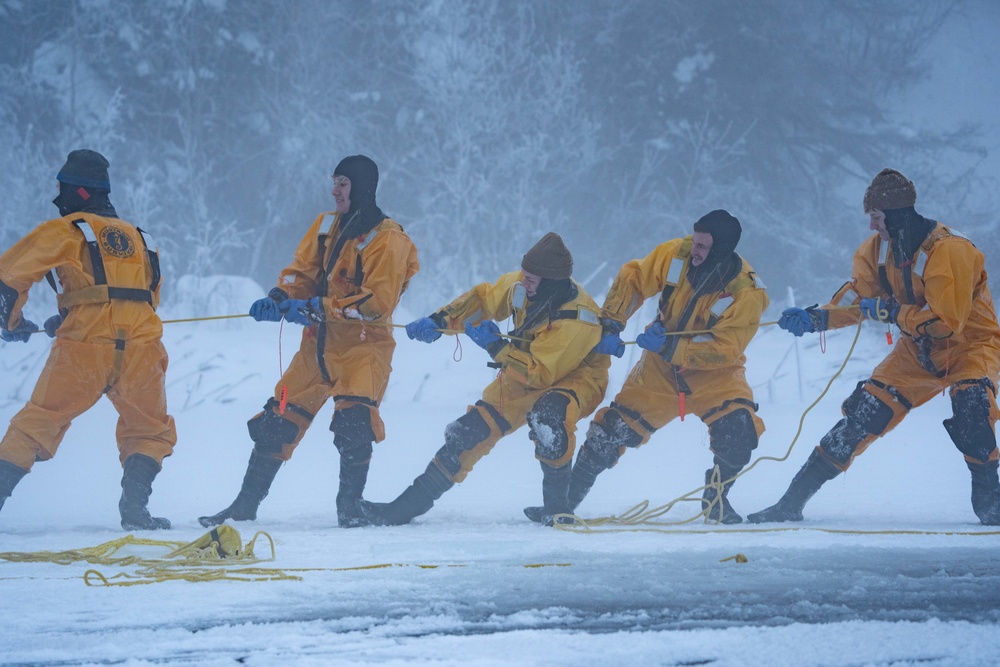 JBER Firefighters conduct Ice Water Rescue Training