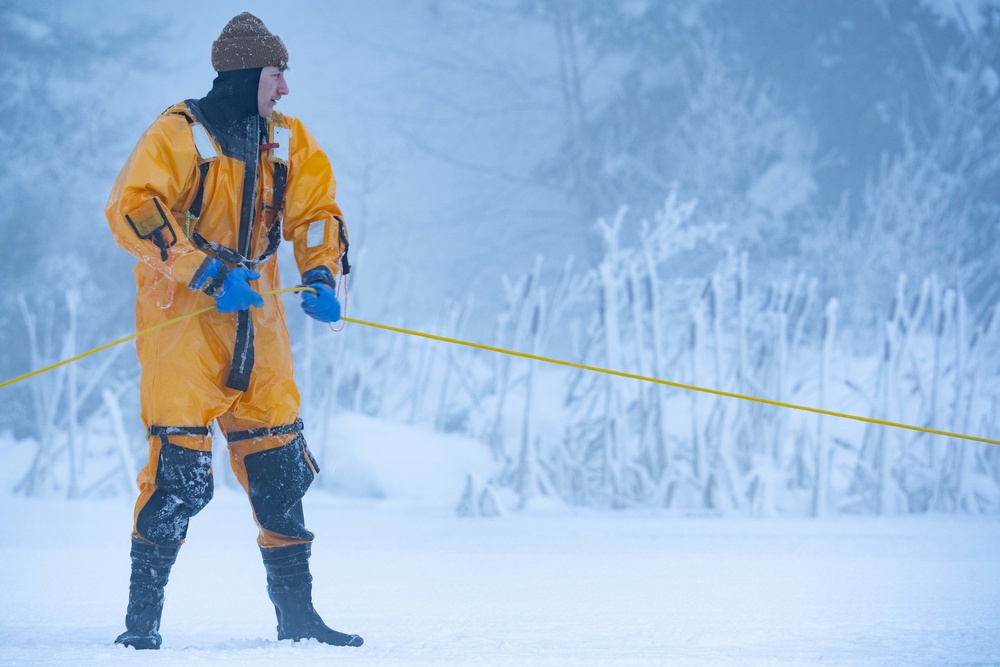 JBER Firefighters conduct Ice Water Rescue Training