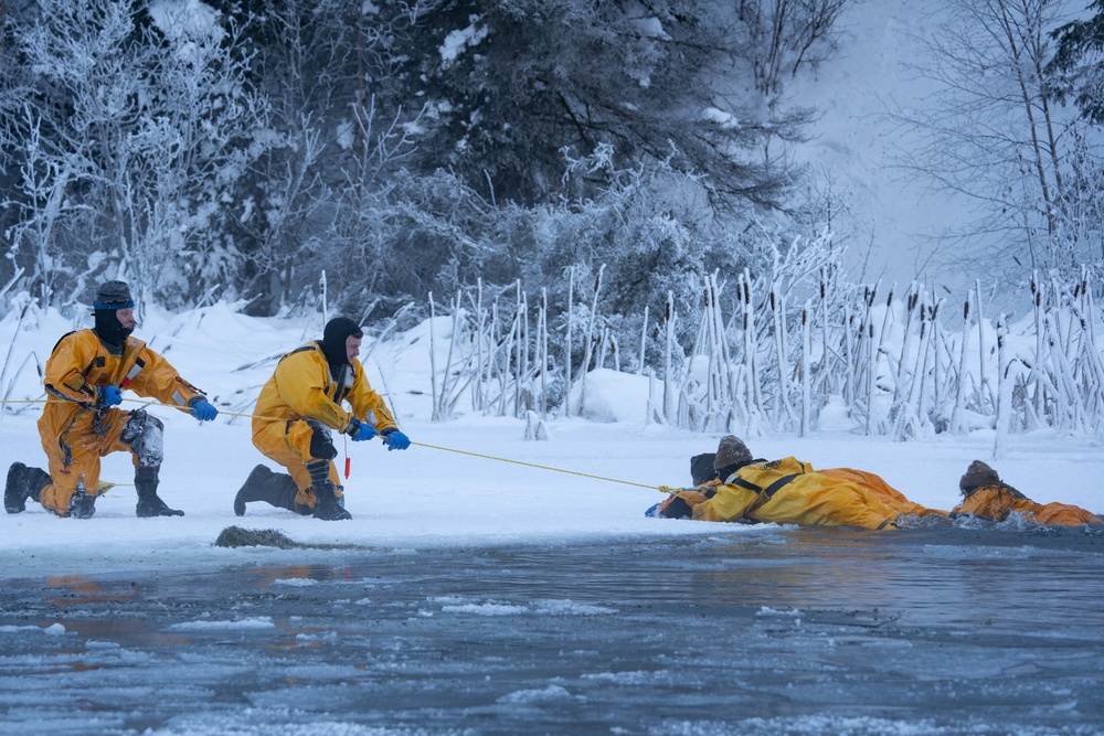 JBER Firefighters conduct Ice Water Rescue Training