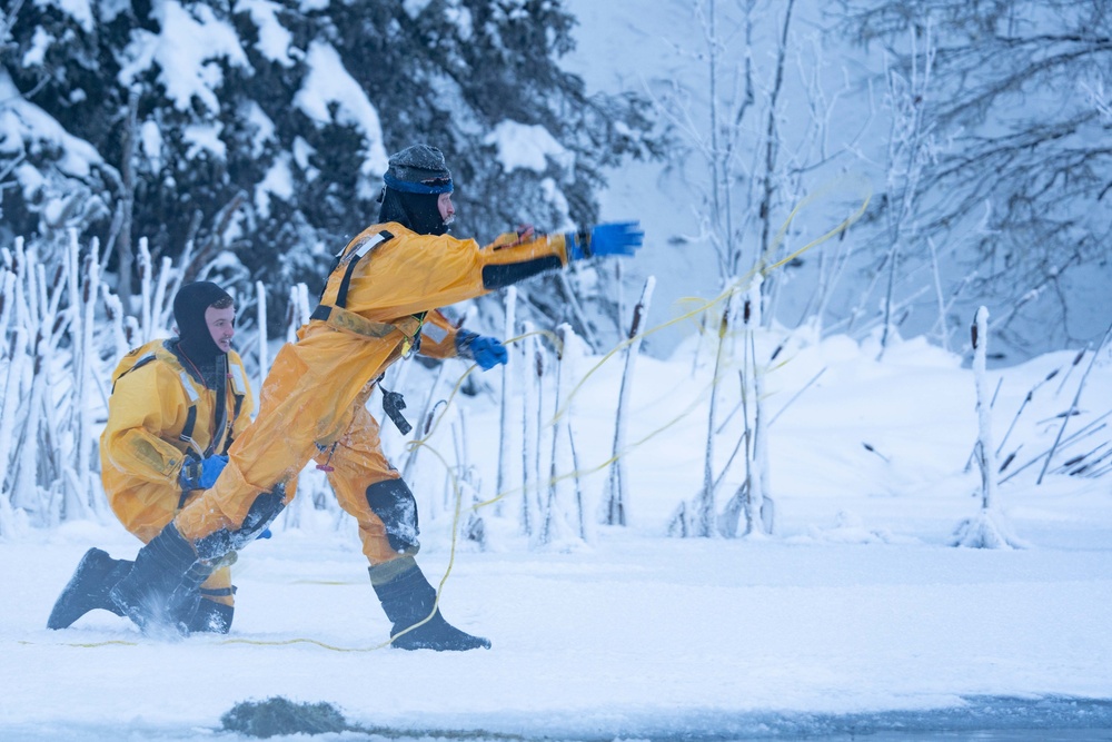 JBER Firefighters conduct Ice Water Rescue Training