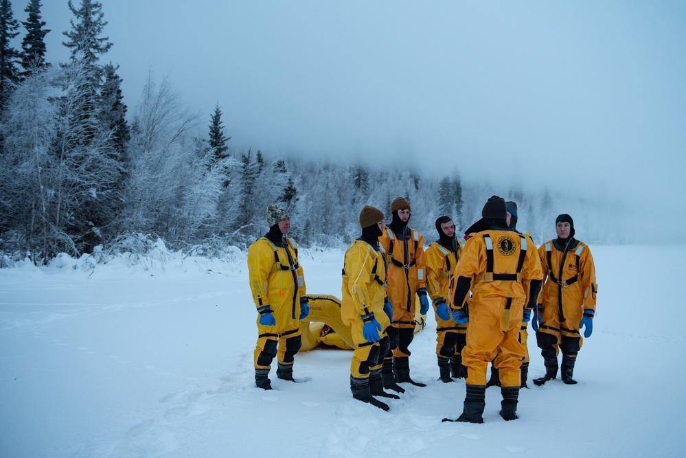 JBER Firefighters conduct Ice Water Rescue Training