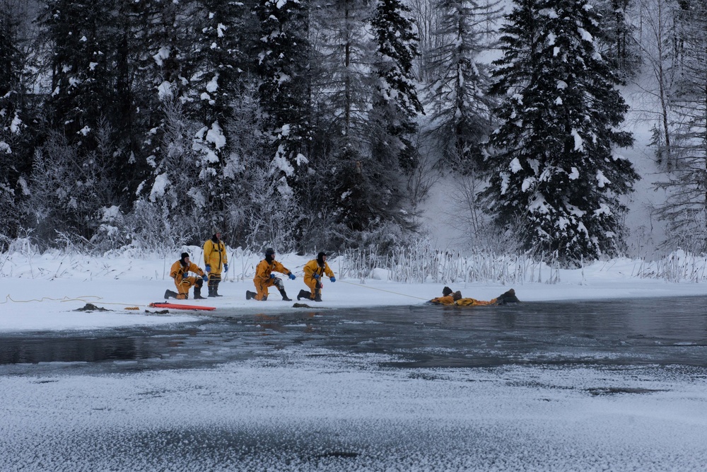 JBER Firefighters conduct Ice Water Rescue Training