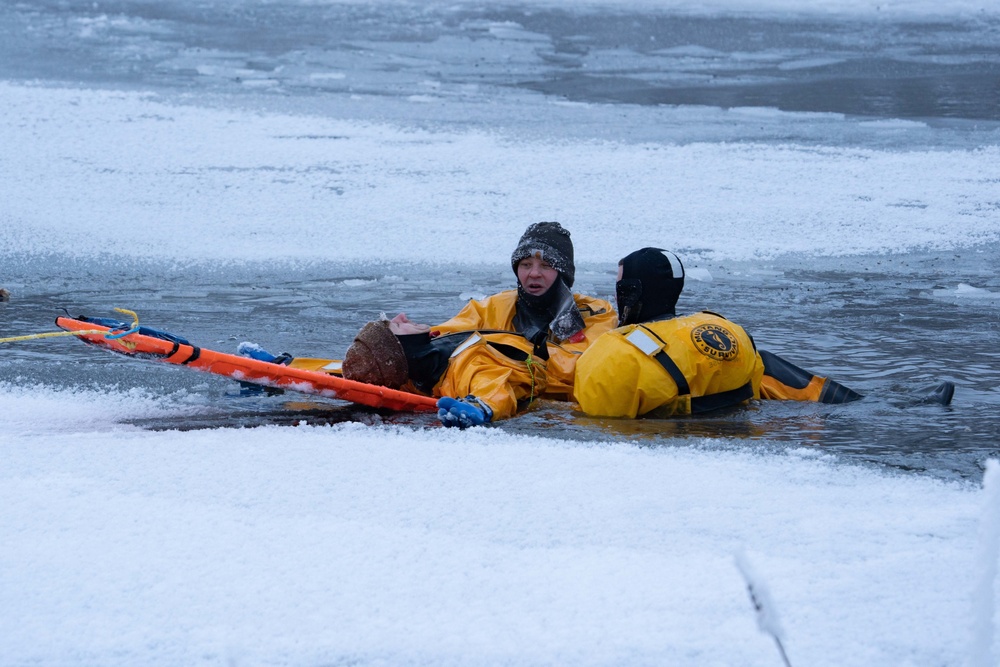 JBER Firefighters conduct Ice Water Rescue Training