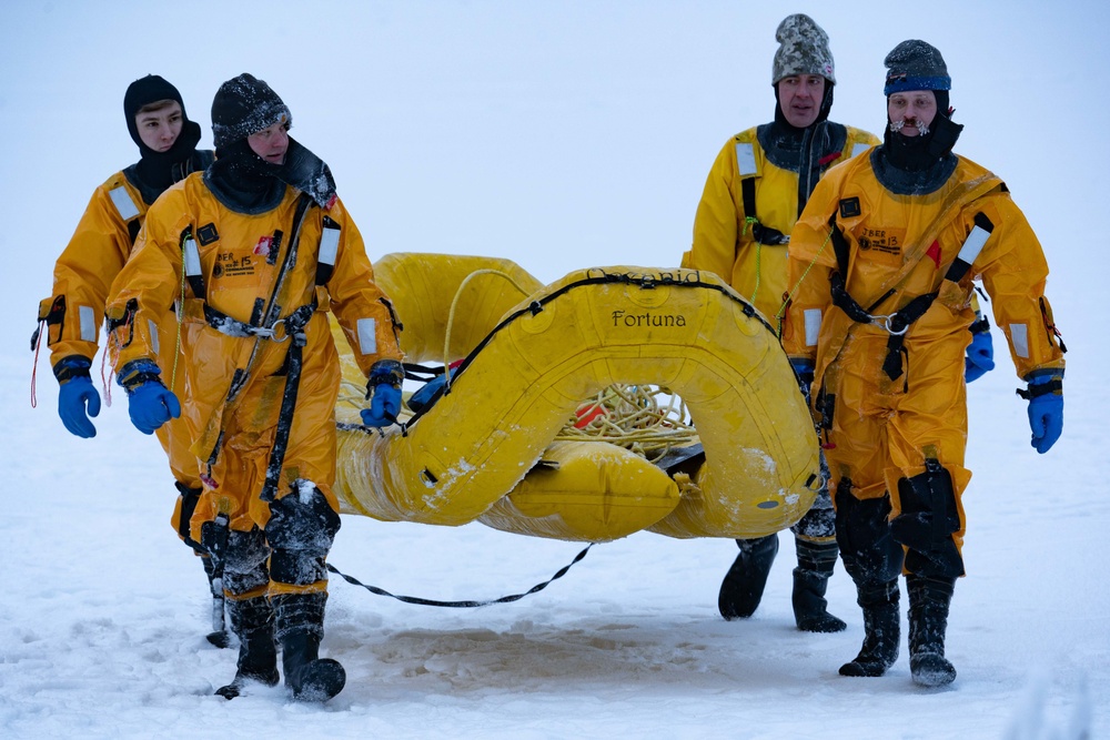 JBER Firefighters conduct Ice Water Rescue Training