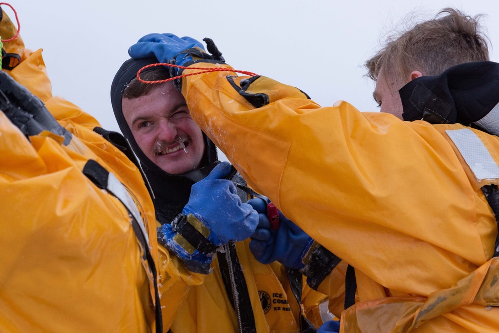 JBER Firefighters conduct Ice Water Rescue Training