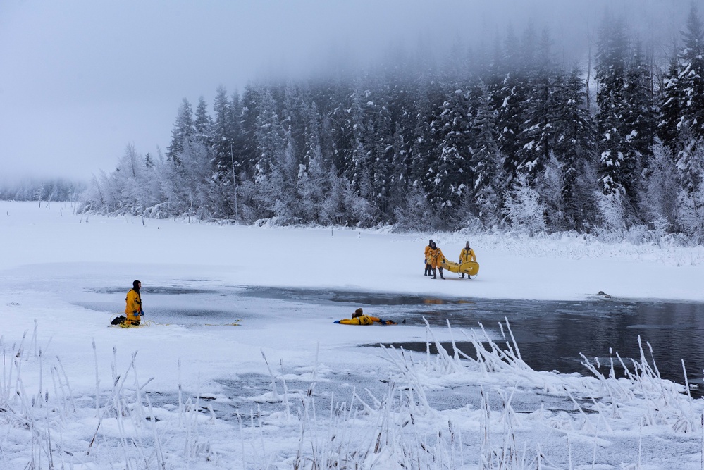 JBER Firefighters conduct Ice Water Rescue Training