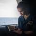 U.S. Navy Sailor Writes Journal Entry