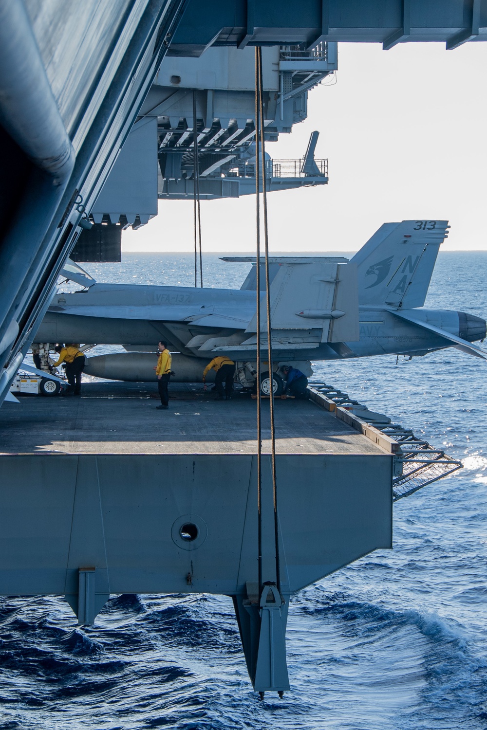 U.S. Navy Sailors Transport F/A-18E