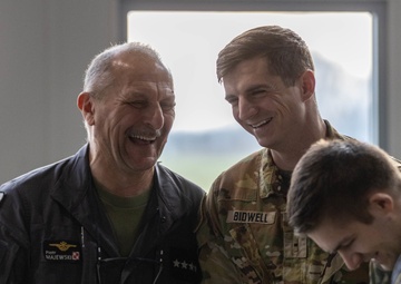 Soldiers from the U.S and Poland share a laugh during a training exercise