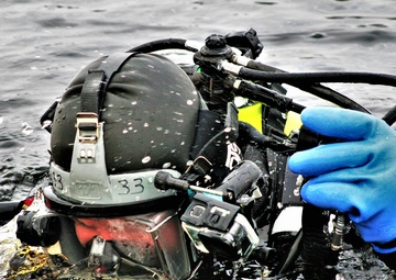 Photo Essay: Firefighters on installation fire department dive team participate in ice rescue training at frozen lake at Fort McCoy, Part II