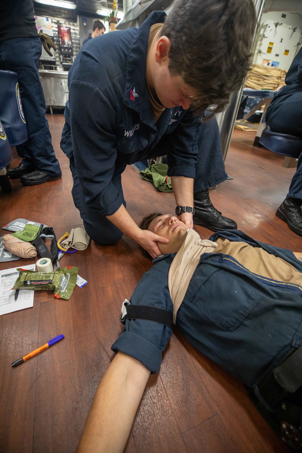 U.S. Navy Sailors participate in first aid training