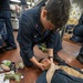 U.S. Navy Sailors participate in first aid training