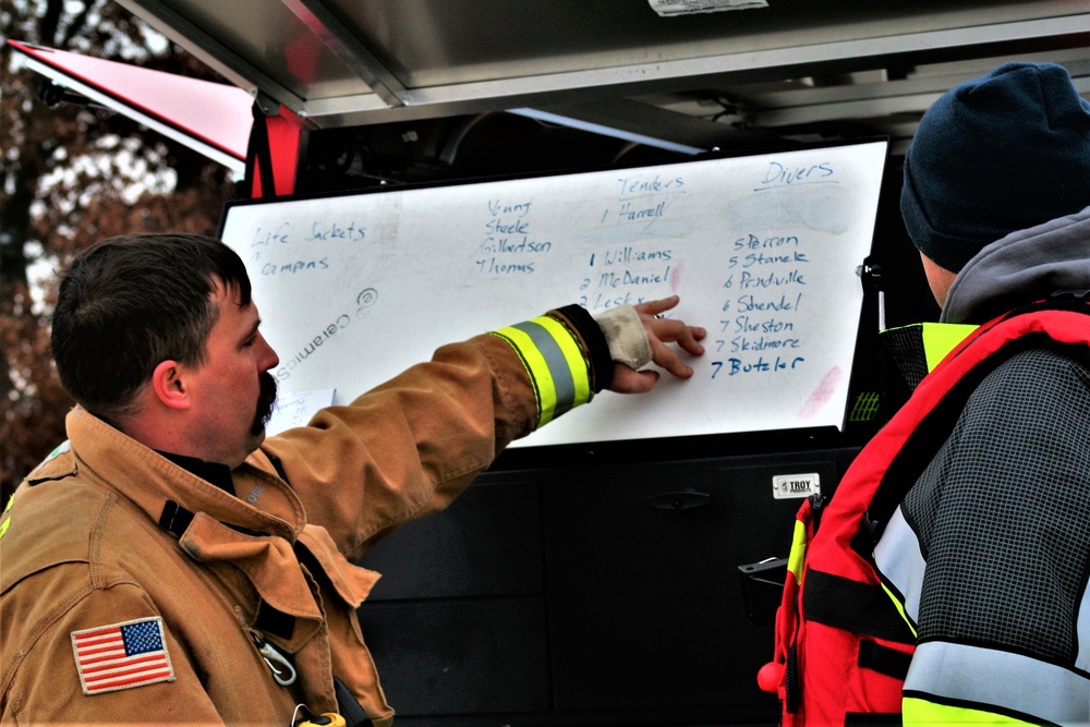 Fort McCoy Fire Department dive team conducts ice rescue training at frozen lake at Fort McCoy