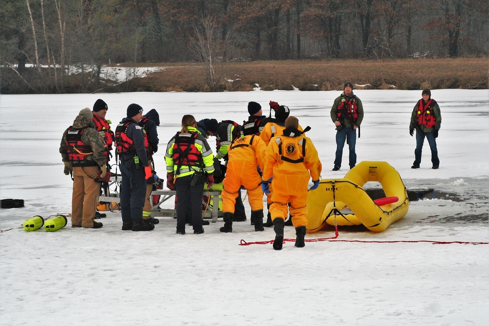 Fort McCoy Fire Department dive team conducts ice rescue training at frozen lake at Fort McCoy