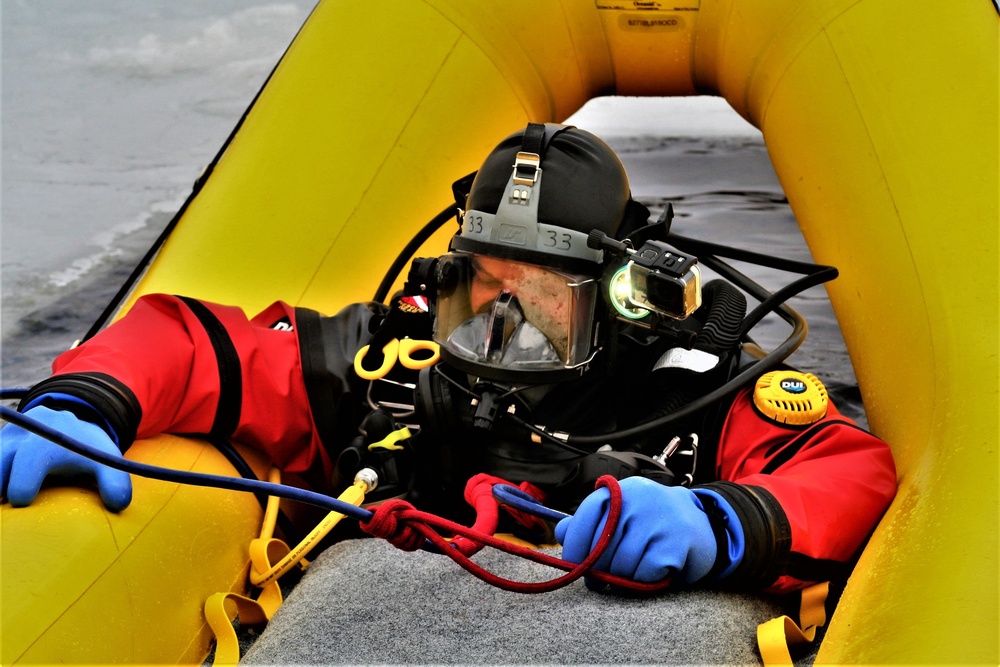 Fort McCoy Fire Department dive team conducts ice rescue training at frozen lake at Fort McCoy