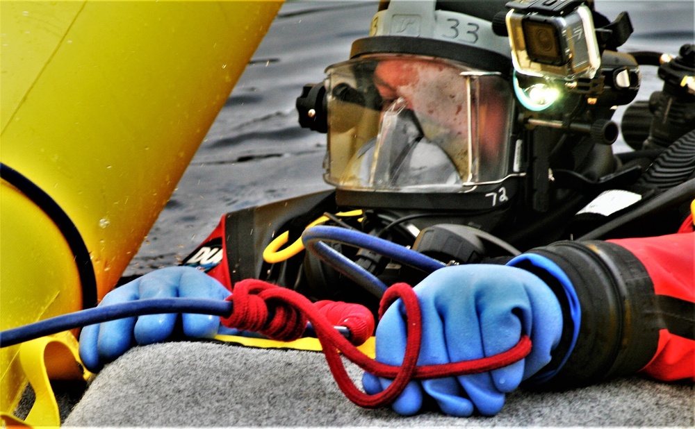 Fort McCoy Fire Department dive team conducts ice rescue training at frozen lake at Fort McCoy