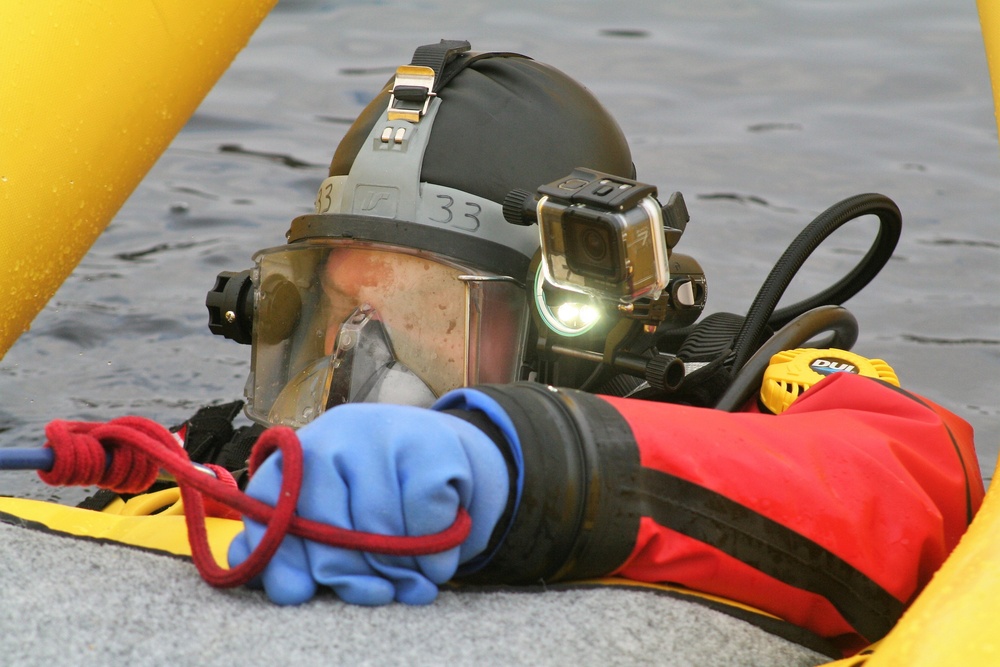 Fort McCoy Fire Department dive team conducts ice rescue training at frozen lake at Fort McCoy