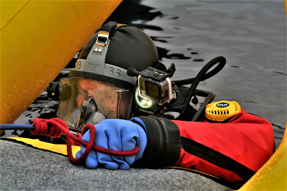 Fort McCoy Fire Department dive team conducts ice rescue training at frozen lake at Fort McCoy