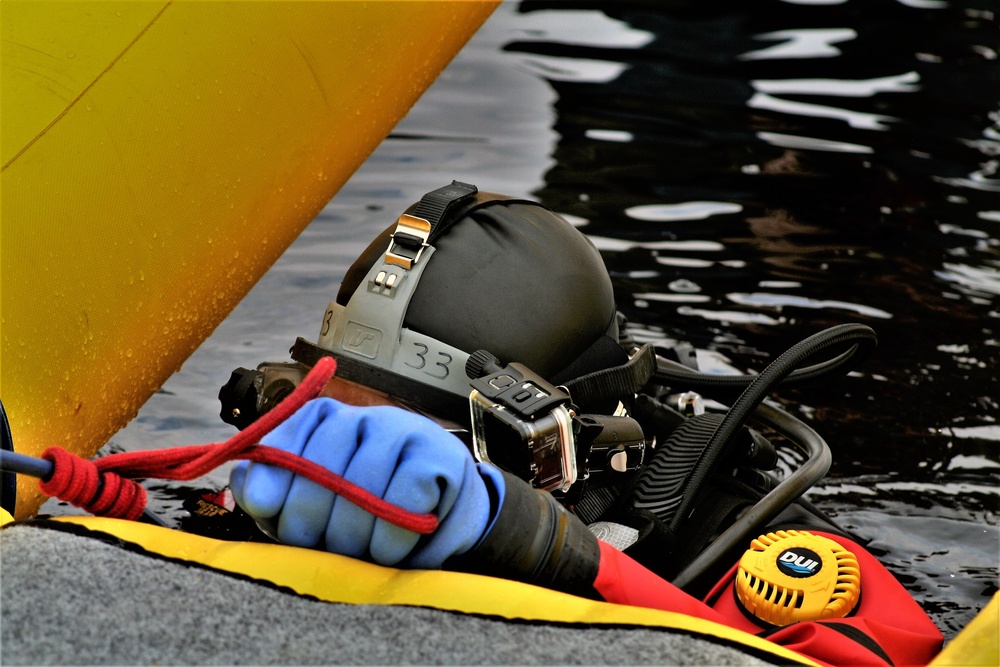 Fort McCoy Fire Department dive team conducts ice rescue training at frozen lake at Fort McCoy