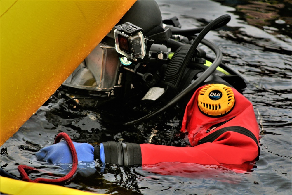 Fort McCoy Fire Department dive team conducts ice rescue training at frozen lake at Fort McCoy