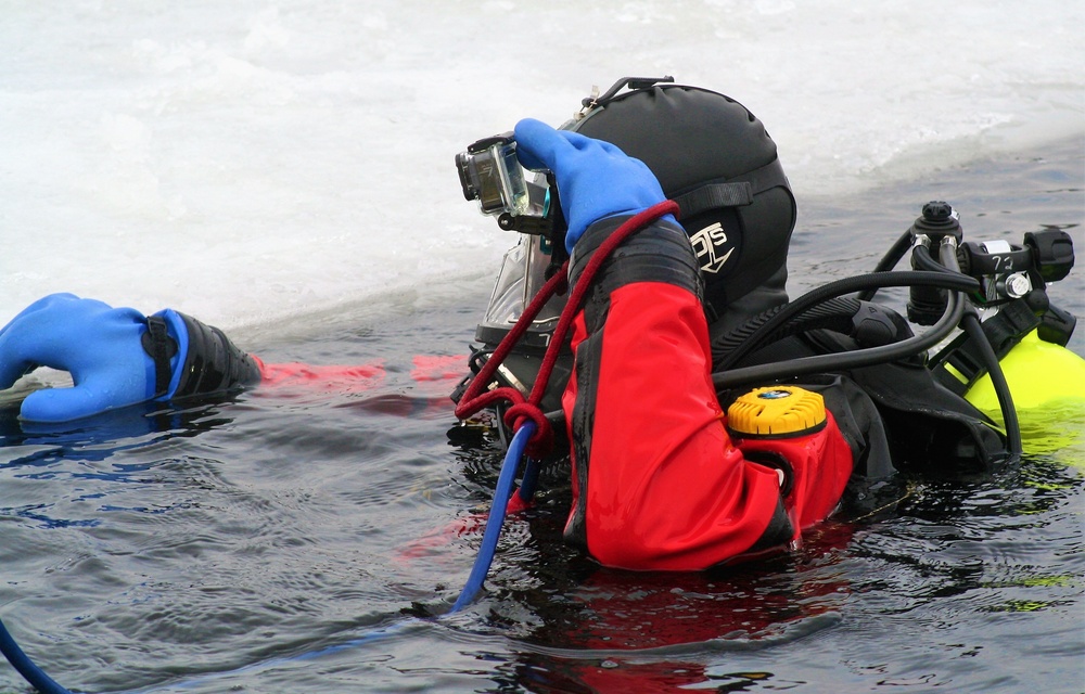 Fort McCoy Fire Department dive team conducts ice rescue training at frozen lake at Fort McCoy