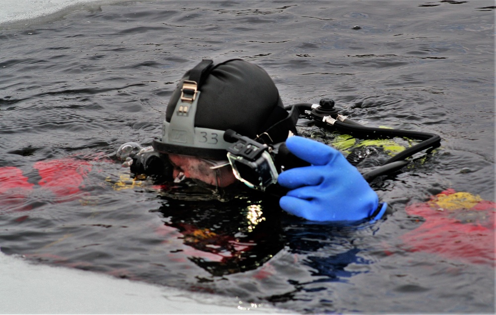 Fort McCoy Fire Department dive team conducts ice rescue training at frozen lake at Fort McCoy