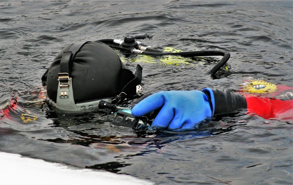 Fort McCoy Fire Department dive team conducts ice rescue training at frozen lake at Fort McCoy