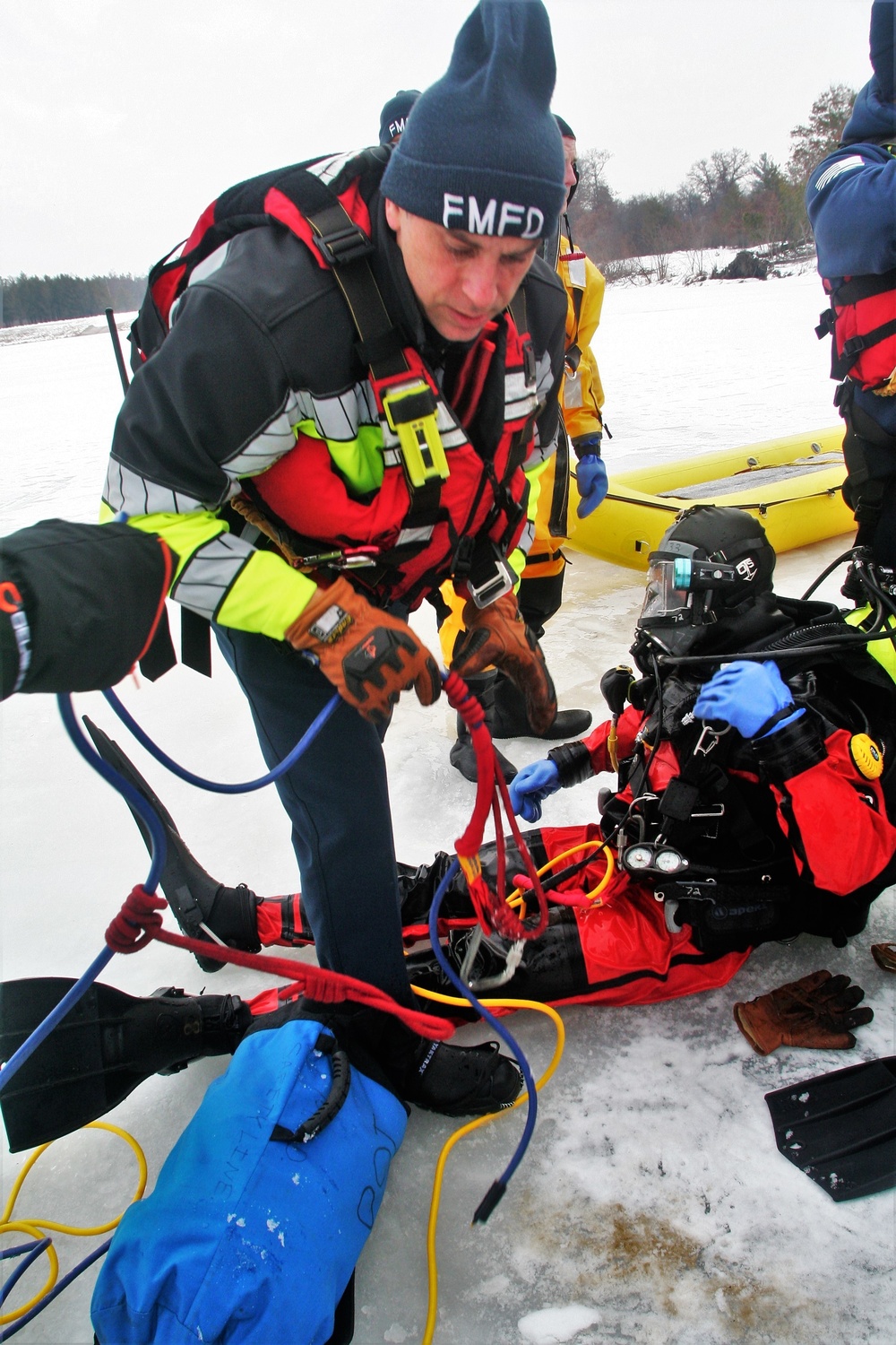 Fort McCoy Fire Department dive team conducts ice rescue training at frozen lake at Fort McCoy