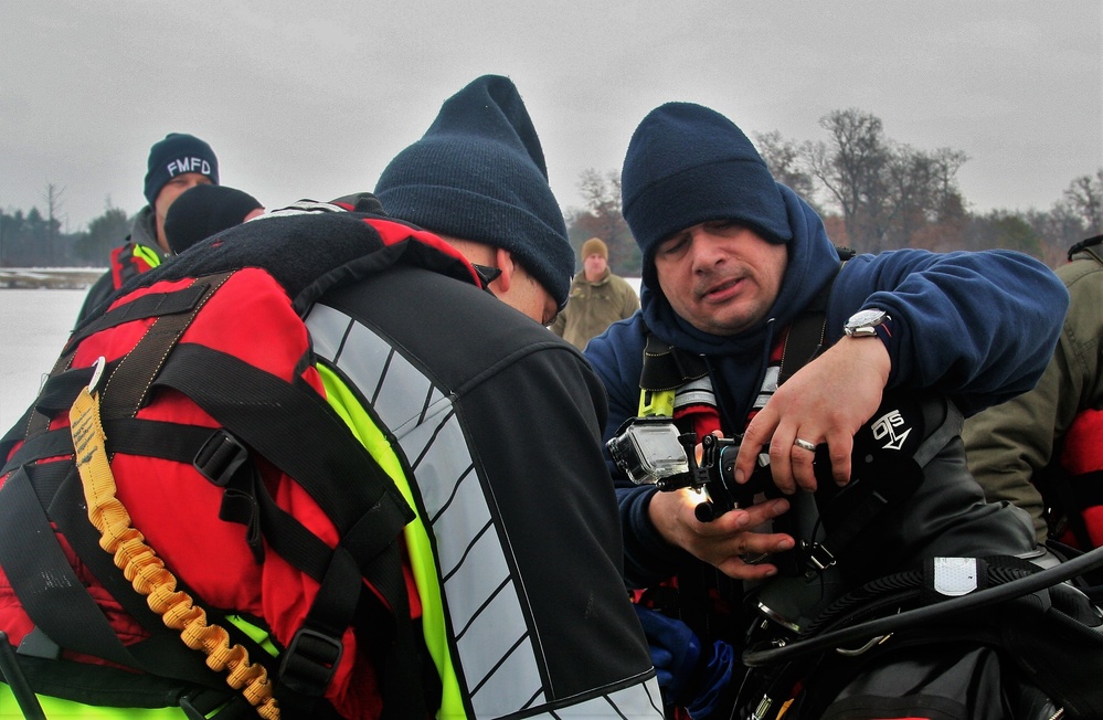 Fort McCoy Fire Department dive team conducts ice rescue training at frozen lake at Fort McCoy