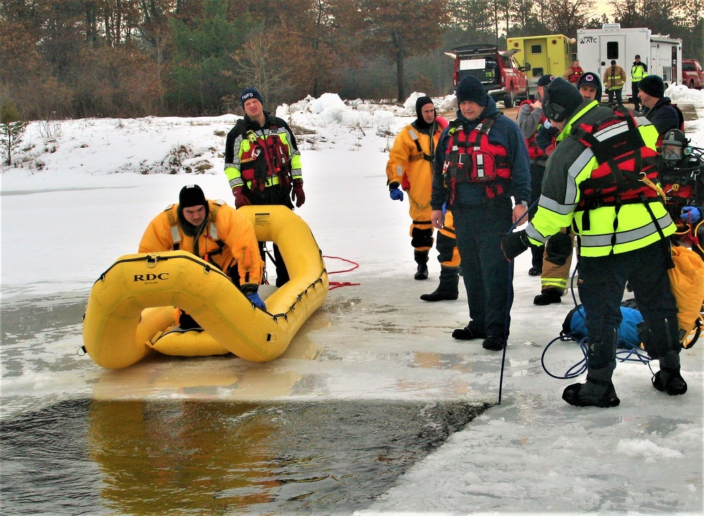 Fort McCoy Fire Department dive team conducts ice rescue training at frozen lake at Fort McCoy