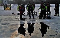 Fort McCoy Fire Department dive team conducts ice rescue training at frozen lake at Fort McCoy
