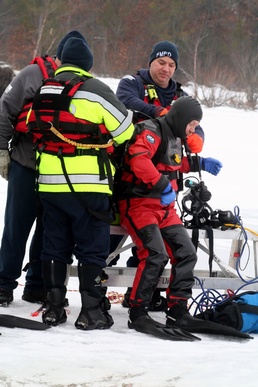 Fort McCoy Fire Department dive team conducts ice rescue training at frozen lake at Fort McCoy