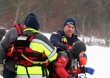Photo Essay: Fort McCoy Fire Department dive team conducts ice rescue training at frozen lake at Fort McCoy, Part III