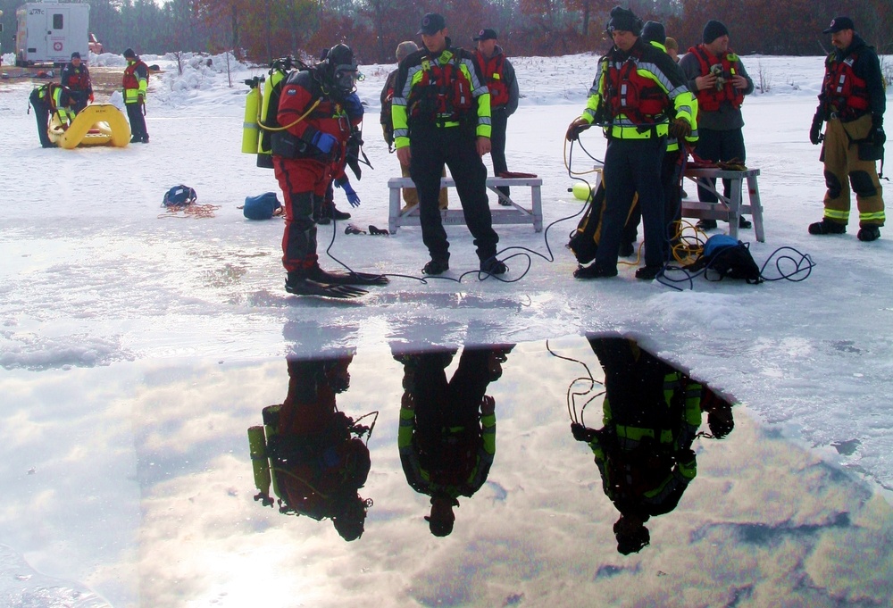 Fort McCoy Fire Department dive team conducts ice rescue training at frozen lake at Fort McCoy