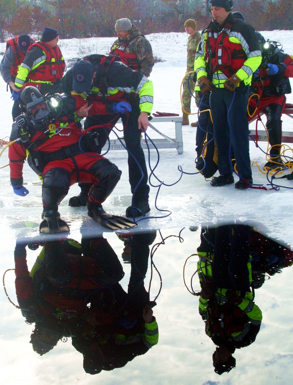 Fort McCoy Fire Department dive team conducts ice rescue training at frozen lake at Fort McCoy