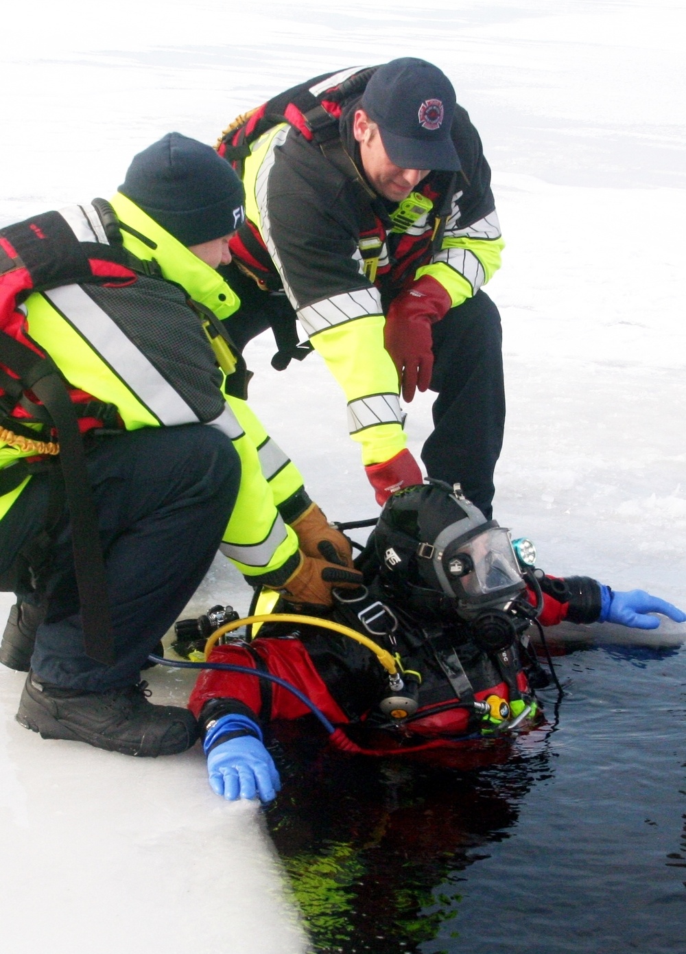 Fort McCoy Fire Department dive team conducts ice rescue training at frozen lake at Fort McCoy