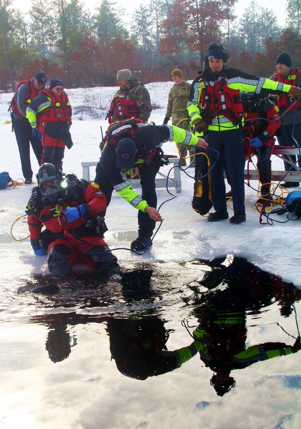 Fort McCoy Fire Department dive team conducts ice rescue training at frozen lake at Fort McCoy