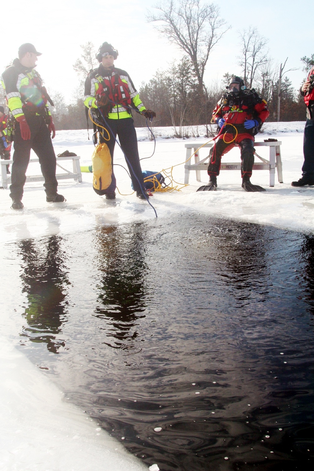 Fort McCoy Fire Department dive team conducts ice rescue training at frozen lake at Fort McCoy