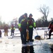 Fort McCoy Fire Department dive team conducts ice rescue training at frozen lake at Fort McCoy