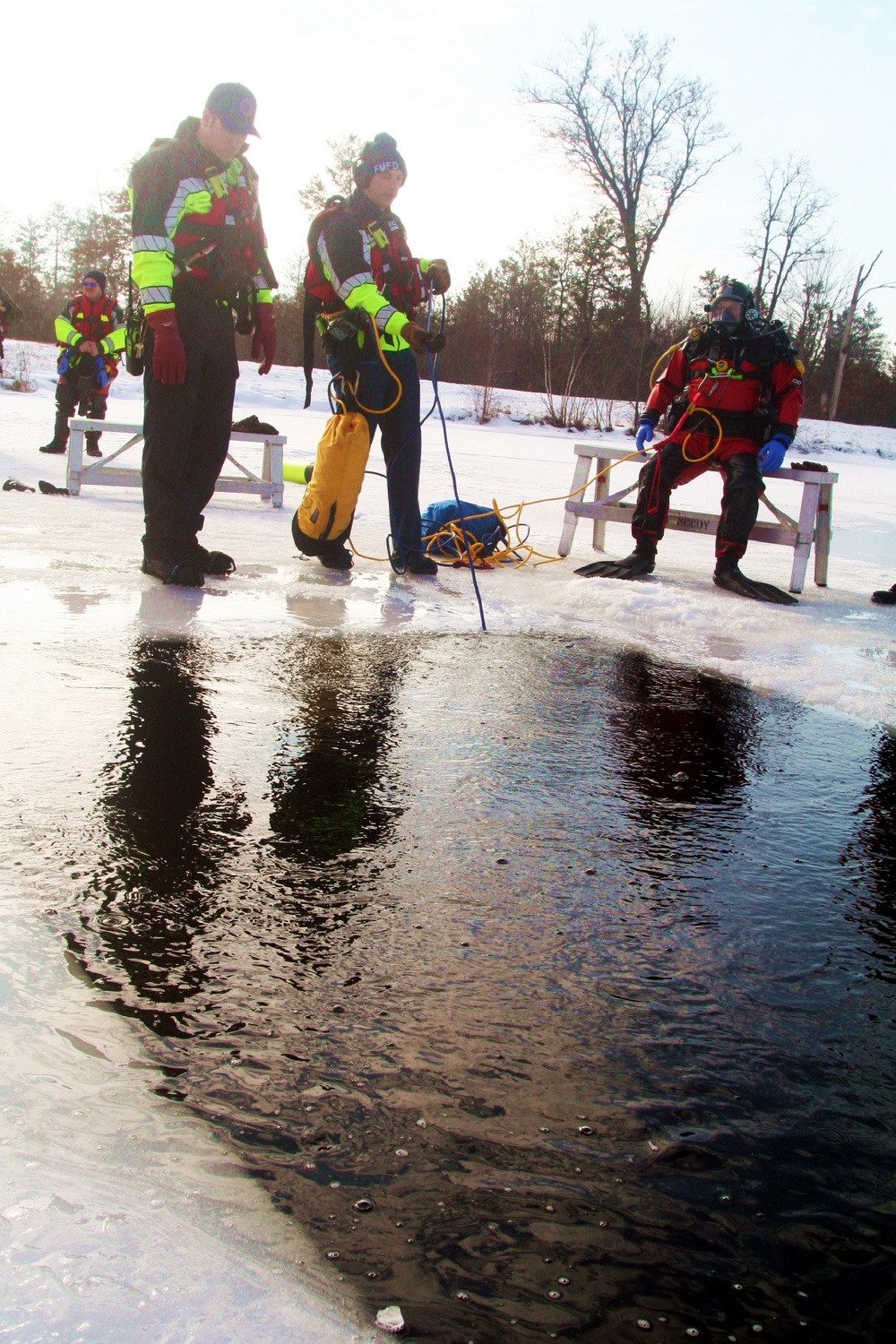 Fort McCoy Fire Department dive team conducts ice rescue training at frozen lake at Fort McCoy