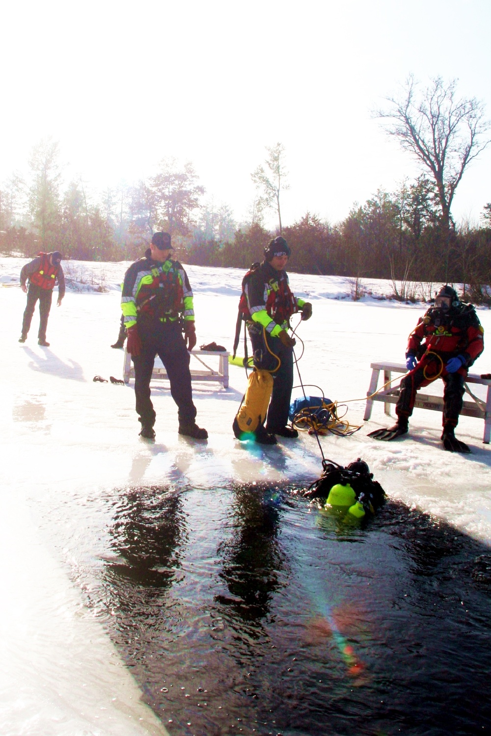 Fort McCoy Fire Department dive team conducts ice rescue training at frozen lake at Fort McCoy