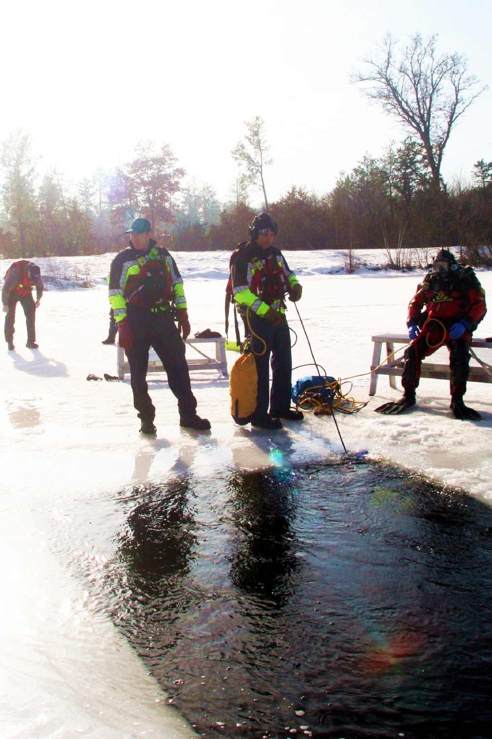 Fort McCoy Fire Department dive team conducts ice rescue training at frozen lake at Fort McCoy