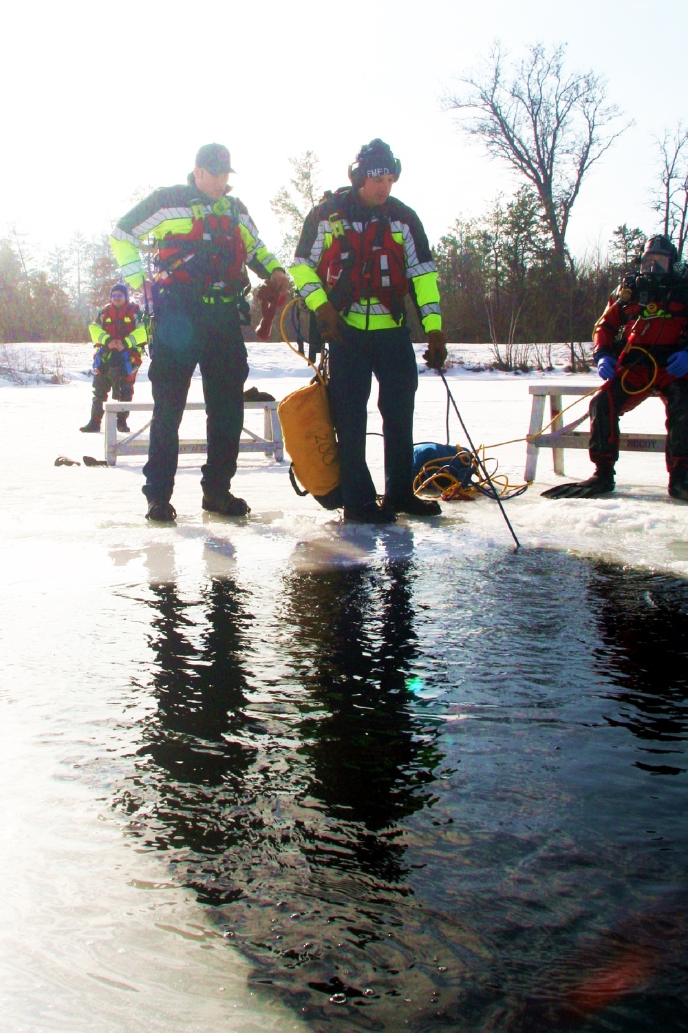 Fort McCoy Fire Department dive team conducts ice rescue training at frozen lake at Fort McCoy